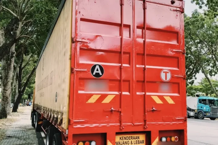 Red curtain-side trailer, rear view